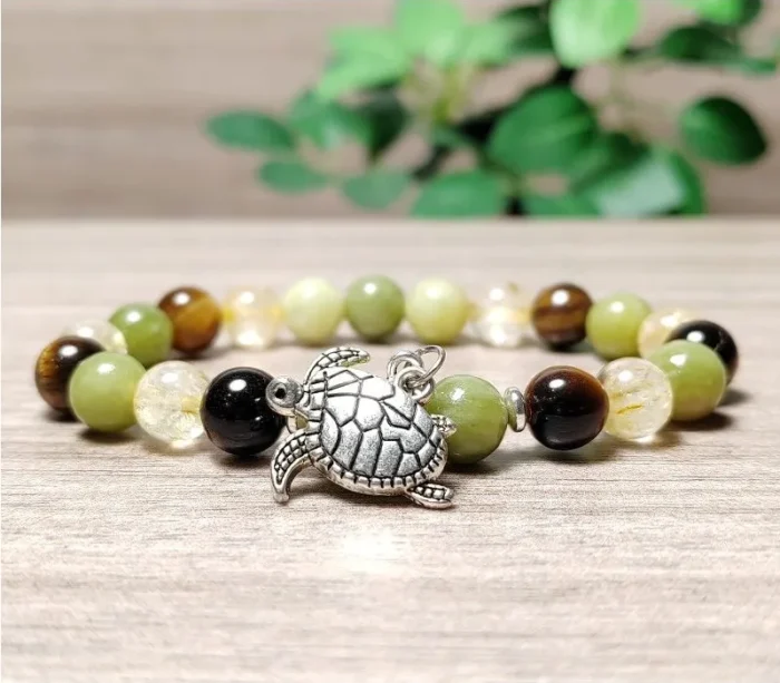 Szerpentin, jáde, tigrisszem, citrin karkötő